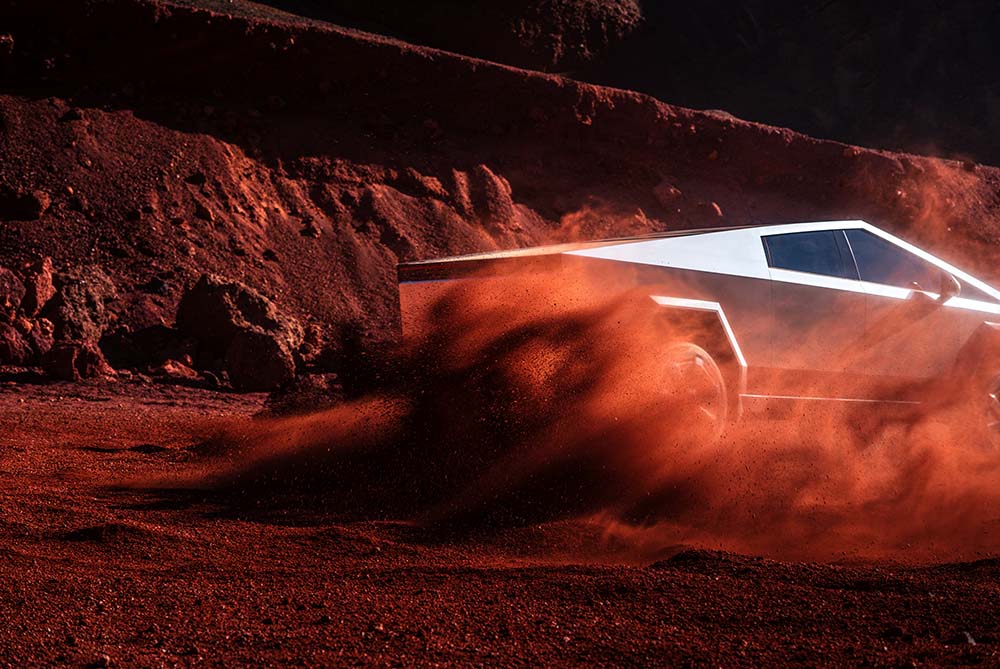 Tesla accelerating through a desert