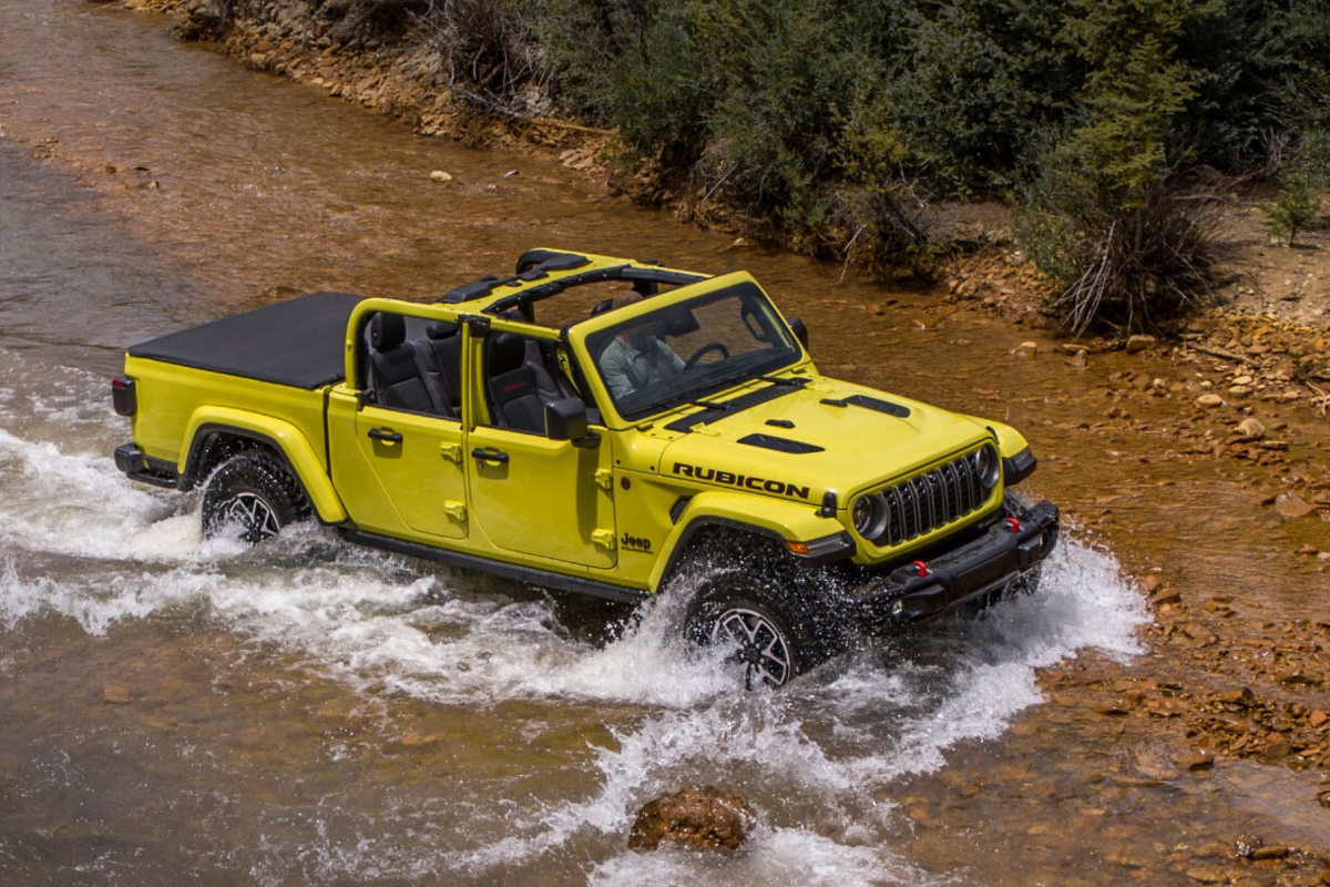 Jeep Gladiator driving in the river