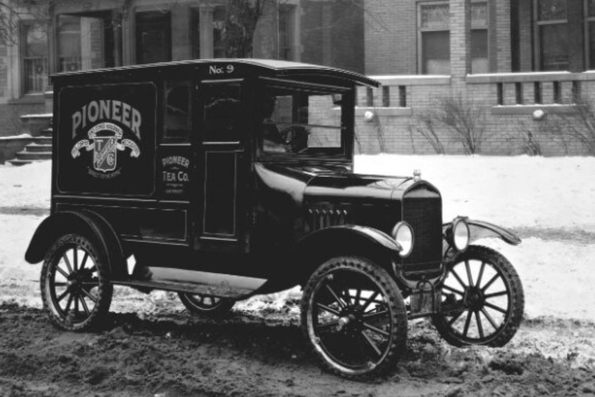 Black and white photo of a Ford pickup in snowy conditions