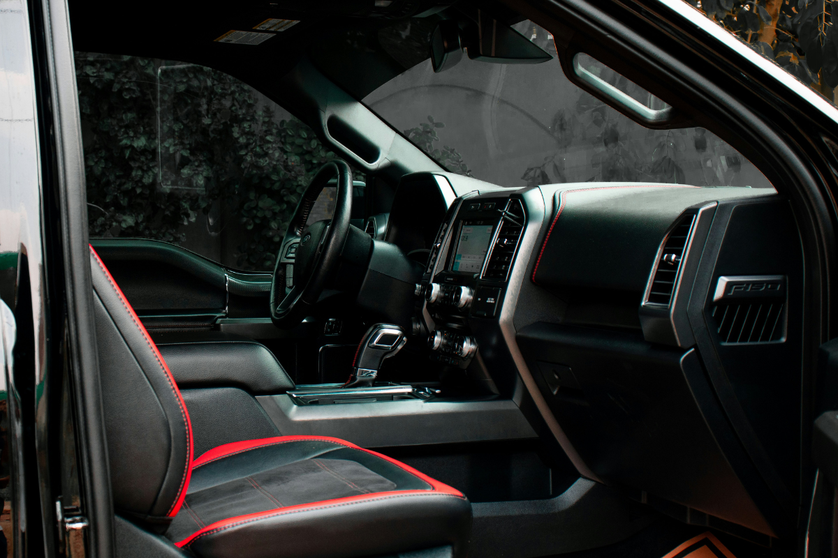 Black interior with red trim on the seats